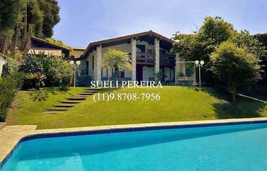 Imagem: A casa em condomínio possui 5 Dormitórios, 5 Banheiros, 5