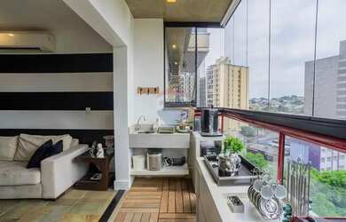 Imagem: O apartamento possui 4 Dormitórios, 4 Banheiros, 2 Vagas na