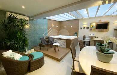 Imagem: A casa em condomínio possui 4 Dormitórios, 5 Banheiros, 4