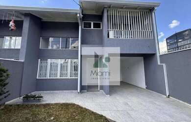 Imagem: A casa possui 3 Dormitórios, 3 Banheiros, 2 Vagas na garagem