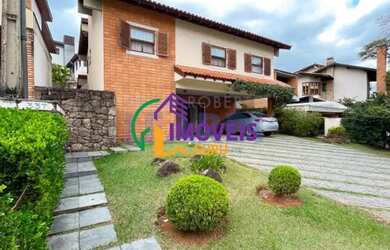 Imagem: A casa em condomínio possui 4 Dormitórios, 5 Banheiros, 2