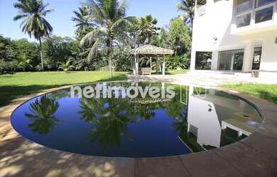 Imagem: A casa possui 4 Dormitórios, 5 Banheiros, 5 Vagas na garagem