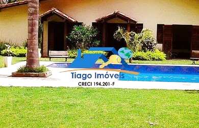 Imagem: A casa possui 4 Dormitórios, 3 Banheiros, 5 Vagas na garagem