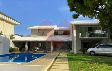 Imagem: A casa possui 5 Dormitórios, 5 Banheiros, 5 Vagas na garagem