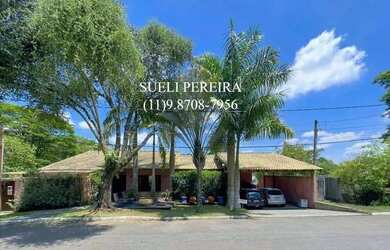 Imagem: A casa em condomínio possui 4 Dormitórios, 5 Banheiros, 4