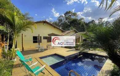 Imagem: A casa em condomínio possui 4 Dormitórios, 3 Banheiros, 5