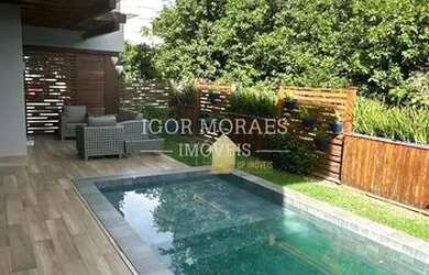 Imagem: A casa em condomínio possui 4 Dormitórios, 5 Banheiros, 2