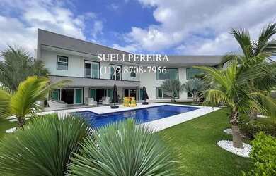 Imagem: A casa em condomínio possui 4 Dormitórios, 5 Banheiros, 5