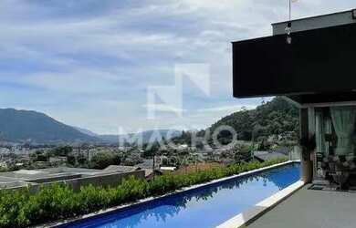 Imagem: A casa possui 4 Dormitórios, 4 Banheiros, 2 Vagas na garagem