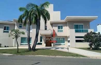 Imagem: A casa em condomínio possui 4 Dormitórios, 5 Banheiros, 5