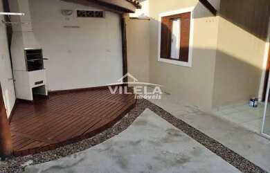 Imagem: A casa possui 2 Dormitórios, 1 Banheiro, 2 Vagas na garagem