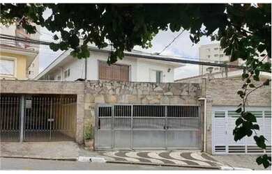 Imagem: A casa possui 4 Dormitórios, 5 Banheiros, 2 Vagas na garagem