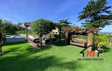 Imagem: A casa possui 4 Dormitórios, 5 Banheiros, 5 Vagas na garagem