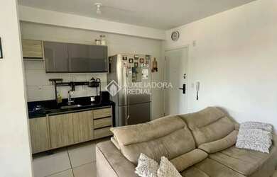 Imagem: O apartamento possui 2 Dormitórios, 1 Banheiro, 2 Vagas na