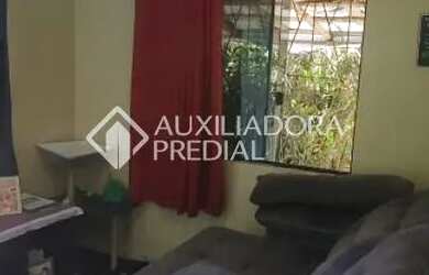 Imagem 6: Terreno de 520 m² arborizado com casa de alvenaria de 2 dormitórios...