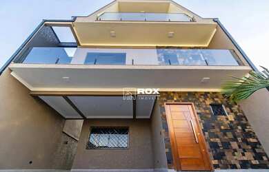 Imagem: A casa possui 3 Dormitórios, 4 Banheiros, 3 Vagas na garagem