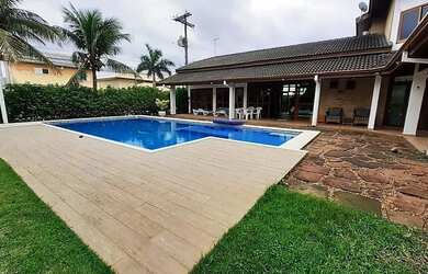 Imagem: A casa em condomínio possui 4 Dormitórios, 5 Banheiros, 4