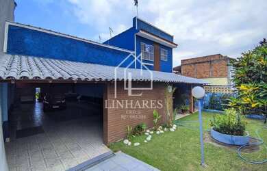 Imagem: A casa possui 5 Dormitórios, 2 Banheiros, 5 Vagas na garagem