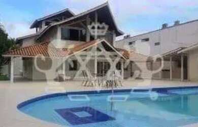 Imagem: A casa possui 5 Dormitórios, 5 Banheiros, 5 Vagas na garagem