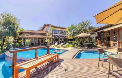 Imagem: A casa em condomínio possui 4 Dormitórios, 5 Banheiros, 5