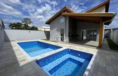 Imagem: A casa possui 3 Dormitórios, 5 Banheiros, 2 Vagas na garagem