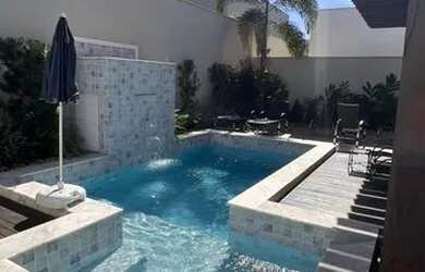 Imagem: A casa em condomínio possui 4 Dormitórios, 5 Banheiros, 4