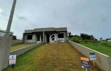 Imagem: A casa possui 2 Dormitórios, 1 Banheiro, 2 Vagas na garagem