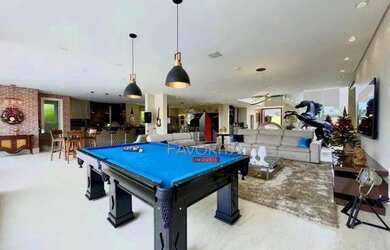 Imagem: A casa em condomínio possui 5 Dormitórios, 5 Banheiros, 5