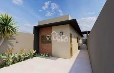 Imagem: A casa possui 3 Dormitórios, 2 Banheiros, 1 Vaga na garagem