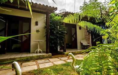 Imagem: A casa possui 3 Dormitórios, 2 Banheiros, 3 Vagas na garagem