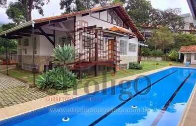 Imagem: A casa possui 5 Dormitórios, 5 Banheiros, 5 Vagas na garagem