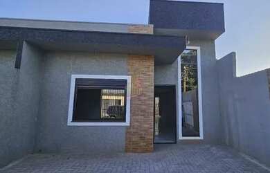 Imagem: A casa possui 3 Dormitórios, 1 Banheiro, 2 Vagas na garagem