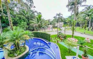 Imagem: A casa possui 5 Dormitórios, 4 Banheiros, 5 Vagas na garagem