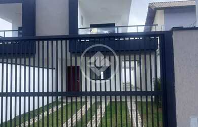 Imagem: A casa possui 3 Dormitórios, 4 Banheiros, 4 Vagas na garagem