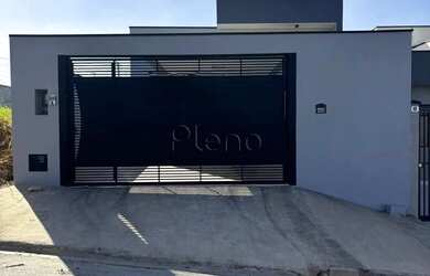 Imagem: A casa possui 3 Dormitórios, 1 Banheiro, 2 Vagas na garagem