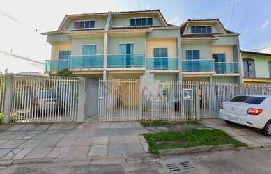 Imagem: A casa possui 3 Dormitórios, 2 Banheiros, 2 Vagas na garagem