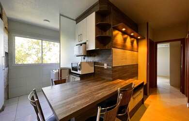 Imagem: O apartamento possui 2 Dormitórios, 1 Banheiro, 1 Vaga na garagem