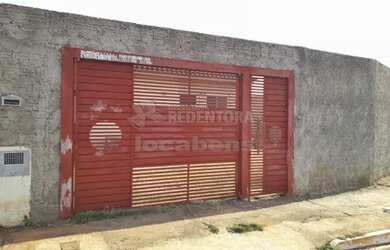 Imagem: A casa possui 2 Dormitórios, 1 Banheiro, 2 Vagas na garagem