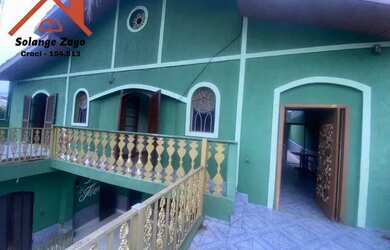 Imagem: A casa possui 4 Dormitórios, 5 Banheiros, 4 Vagas na garagem