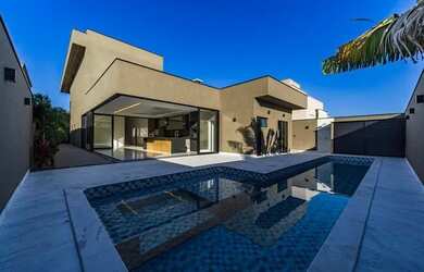 Imagem: A casa em condomínio à venda possui 4 Dormitórios, 5 Banheiros