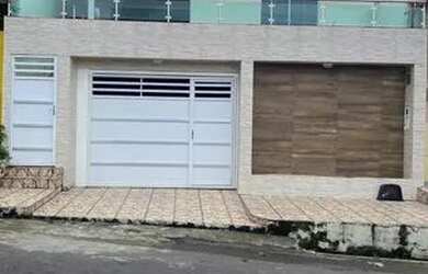Imagem: A casa possui 4 Dormitórios, 4 Banheiros, 2 Vagas na garagem