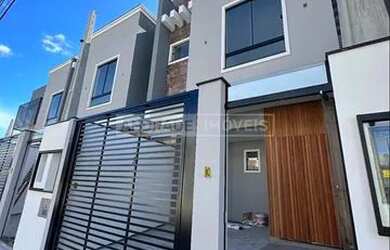 Imagem: A casa possui 2 Dormitórios, 3 Banheiros, 1 Vaga na garagem