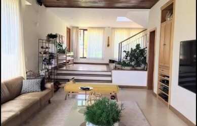 Imagem: A casa em condomínio possui 4 Dormitórios, 5 Banheiros, 5