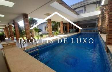 Imagem: A casa em condomínio possui 5 Dormitórios, 5 Banheiros, 5