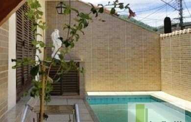 Imagem: A casa em condomínio possui 4 Dormitórios, 3 Banheiros, 1