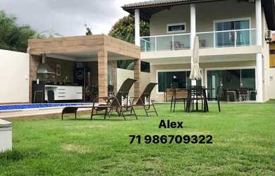 Imagem: A casa possui 4 Dormitórios, Acomodam 12 pessoas, 5 Vagas na