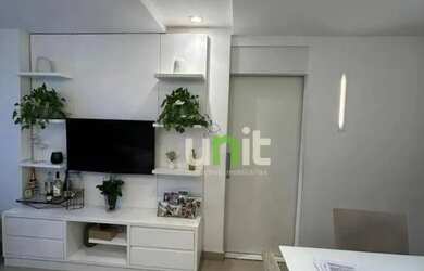 Imagem: O apartamento possui 2 Dormitórios, 1 Banheiro, 1 Vaga na garagem