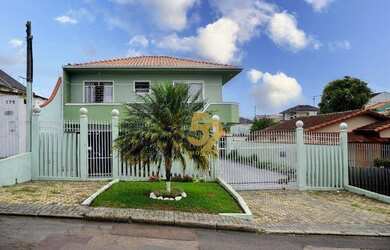 Imagem: A casa possui 3 Dormitórios, 3 Banheiros, 5 Vagas na garagem