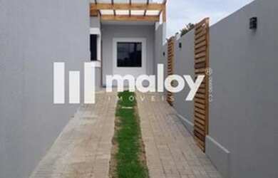 Imagem: A casa possui 2 Dormitórios, 2 Banheiros, 2 Vagas na garagem