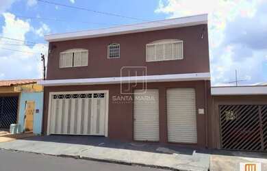 Imagem: A casa possui 3 Dormitórios, 2 Banheiros, 2 Vagas na garagem